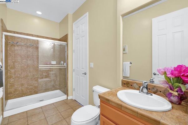 Bathroom, Glass Shower, Interior, Recessed Lighting, Tile Countertops