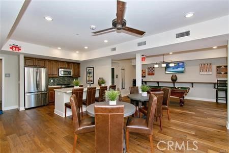 Billiard Table, Dining room, Interior, Kitchen, Pendant Lights, Recessed Lighting, Stainless Steel Appliances, Wood Texture Flooring
