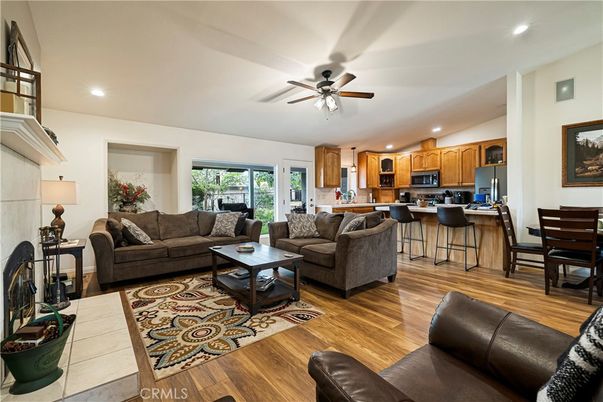 Dining room, Fireplace, Interior, Kitchen, Living room, Recessed Lighting, Wood Texture Flooring