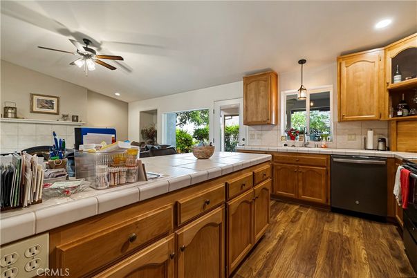 Interior, Kitchen, Pendant Lights, Recessed Lighting, Tile Countertops, Wood Texture Flooring
