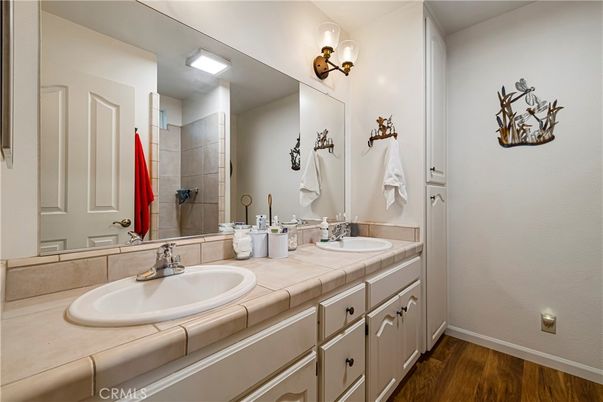 Bathroom, Dual Sink Vanities, Interior, Tile Countertops, Wood Texture Flooring