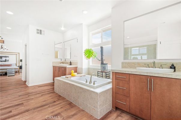 Bathroom, Dual Sink Vanities, Interior, Recessed Lighting, Wood Texture Flooring