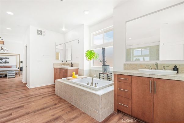 Bathroom, Dual Sink Vanities, Interior, Recessed Lighting, Wood Texture Flooring