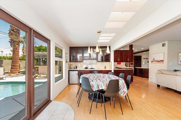 Dining room, Interior, Kitchen, Pendant Lights, Recessed Lighting, Stainless Steel Appliances, Wood Texture Flooring