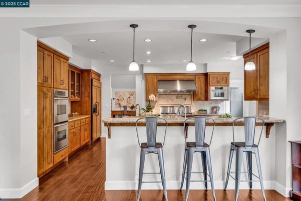 Interior, Kitchen, Pendant Lights, Recessed Lighting, Stainless Steel Appliances, Wood Texture Flooring