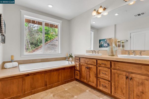 Bathroom, Dual Sink Vanities, Interior, Recessed Lighting, Tile Countertops