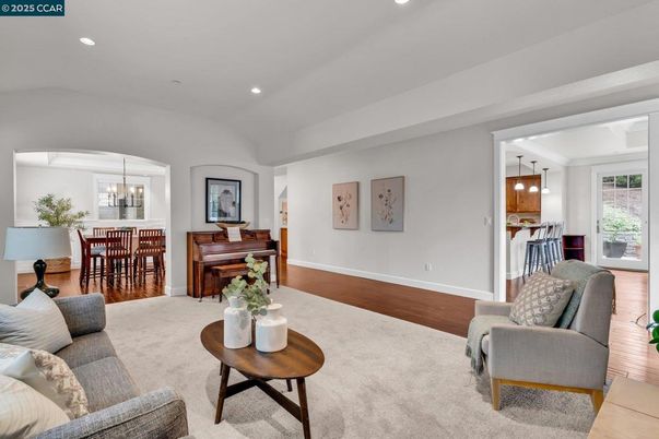 Chandelier, Dining room, Interior, Living room, Pendant Lights, Piano, Recessed Lighting, Wood Texture Flooring