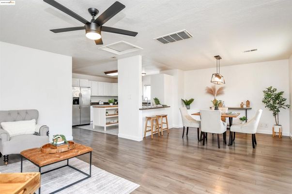 Dining room, Interior, Kitchen, Pendant Lights, Stainless Steel Appliances, Wood Texture Flooring