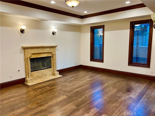 Empty room, Fireplace, Interior, Recessed Lighting, Wood Texture Flooring