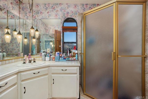 Bathroom, Dual Sink Vanities, Glass Shower, Interior, Pendant Lights, Tile Countertops