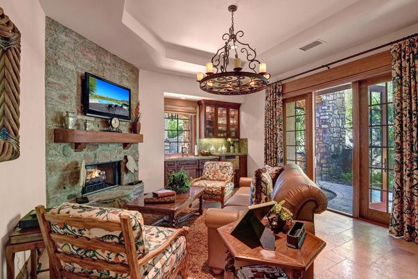 Chandelier, Fireplace, Interior, Living room, Stone Walls