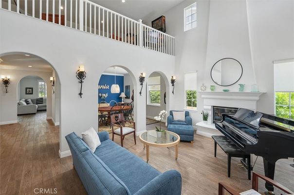 Fireplace, Interior, Living room, Piano, Recessed Lighting, Wood Texture Flooring