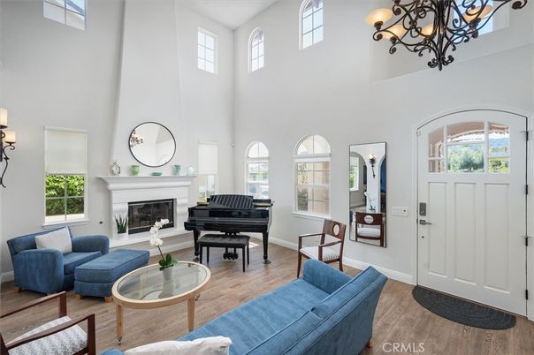 Chandelier, Fireplace, Interior, Living room, Piano, Wood Texture Flooring