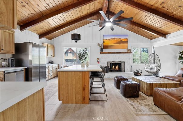 Fireplace, Interior, Kitchen, Living room, Pendant Lights, Stainless Steel Appliances, Wooden Beams, Wooden Ceilings, Wood Texture Flooring
