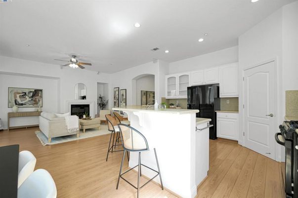 Fireplace, Interior, Kitchen, Living room, Recessed Lighting, Wood Texture Flooring