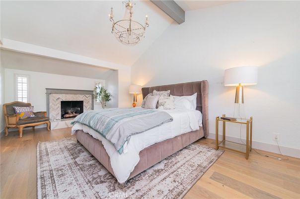 Bedroom, Chandelier, Fireplace, Interior, Wood Texture Flooring