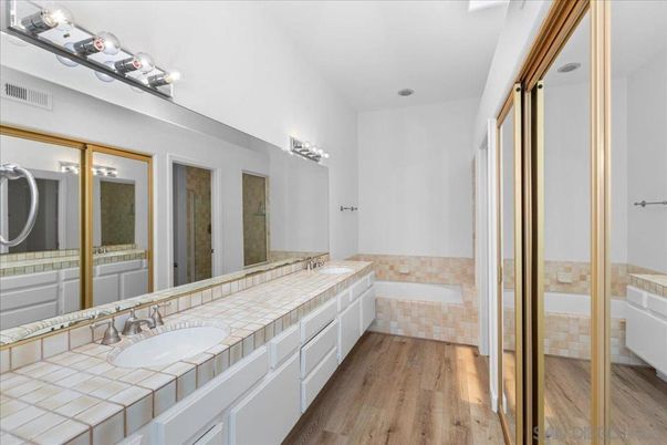 Bathroom, Dual Sink Vanities, Interior, Tile Countertops, Wood Texture Flooring