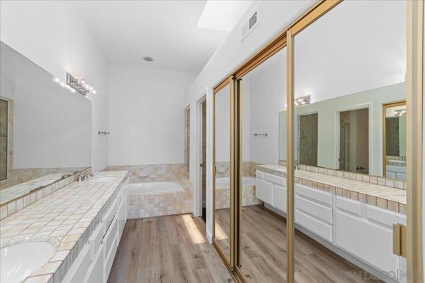 Bathroom, Dual Sink Vanities, Interior, Tile Countertops, Wood Texture Flooring
