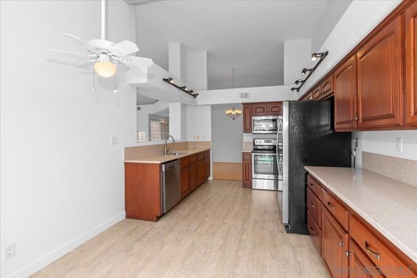 Chandelier, Interior, Kitchen, Pendant Lights, Stainless Steel Appliances, Wood Texture Flooring