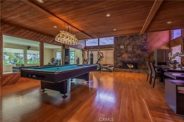 Billiard Table, Dining room, Fireplace, Game Room, Interior, Recessed Lighting, Stone Walls, Wooden Beams, Wooden Ceilings, Wood Texture Flooring
