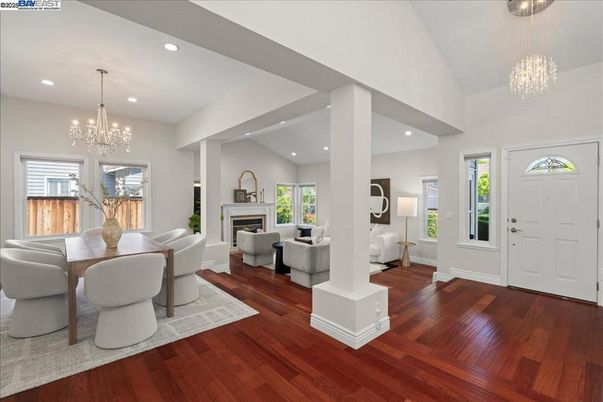 Chandelier, Dining room, Fireplace, Interior, Living room, Recessed Lighting, Wood Texture Flooring