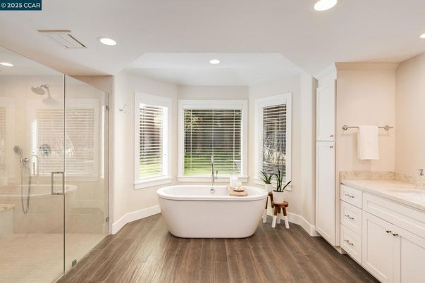Bathroom, Free Standing Baths, Glass Shower, Interior, Recessed Lighting, Wood Texture Flooring