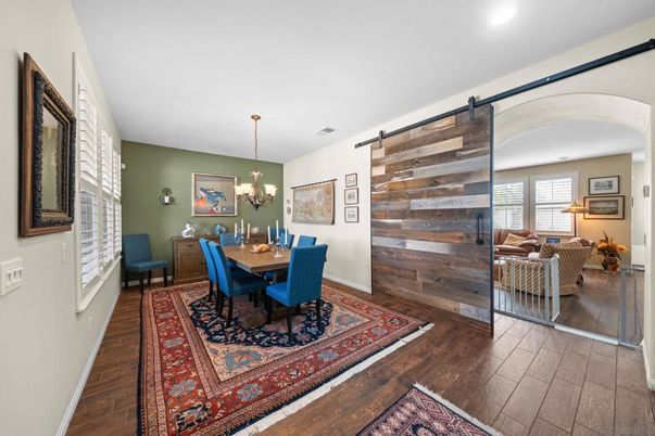 Chandelier, Dining room, Interior, Living room, Recessed Lighting, Wood Texture Flooring, Wooden Walls
