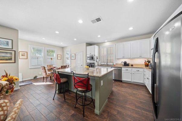 Dining room, Interior, Kitchen, Recessed Lighting, Stainless Steel Appliances, Wood Texture Flooring