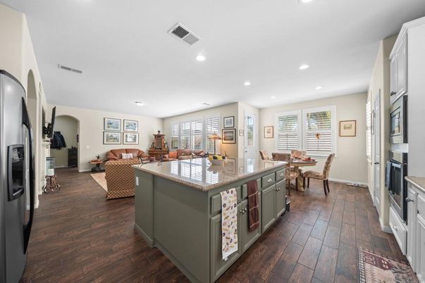 Dining room, Fireplace, Interior, Kitchen, Living room, Recessed Lighting, Wood Texture Flooring