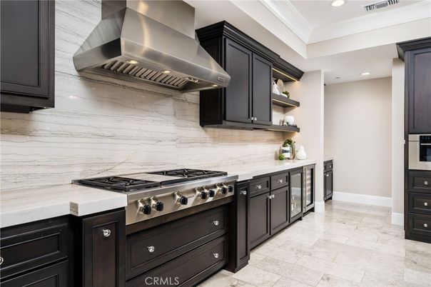Interior, Kitchen, Marble Walls, Recessed Lighting, Stainless Steel Appliances