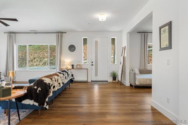 Fireplace, Interior, Kitchen, Living room, Recessed Lighting, Stainless Steel Appliances, Wood Texture Flooring