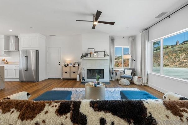 Dining room, Fireplace, Interior, Kitchen, Living room, Pendant Lights, Recessed Lighting, Stainless Steel Appliances, Wood Texture Flooring