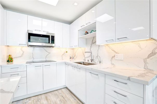 Interior, Kitchen, Marble Walls, Recessed Lighting, Wood Texture Flooring