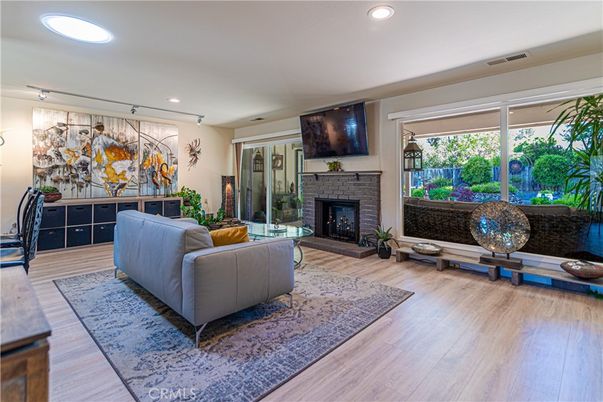 Fireplace, Interior, Living room, Recessed Lighting, Wood Texture Flooring