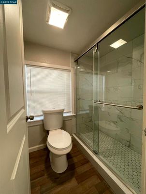 Bathroom, Glass Shower, Interior, Marble Walls, Wood Texture Flooring