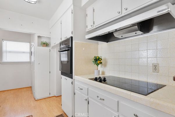 Interior, Kitchen, Tile Countertops, Wood Texture Flooring