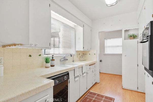 Interior, Kitchen, Tile Countertops, Wood Texture Flooring