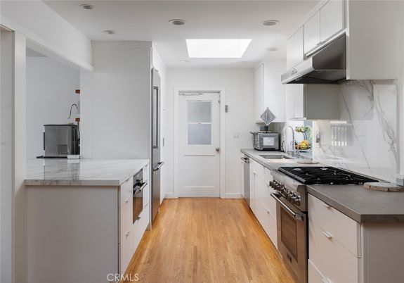 Interior, Kitchen, Marble Walls, Recessed Lighting, Wood Texture Flooring