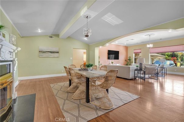 Dining room, Fireplace, Interior, Living room, Pendant Lights, Recessed Lighting, Wood Texture Flooring