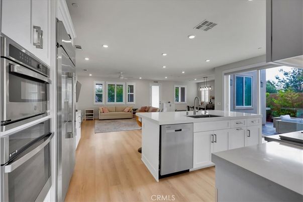 Dining room, Interior, Kitchen, Living room, Pendant Lights, Recessed Lighting, Stainless Steel Appliances, Wood Texture Flooring