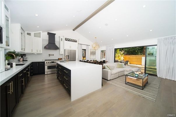 Chandelier, Interior, Kitchen, Living room, Recessed Lighting, Stainless Steel Appliances, Wooden Beams, Wood Texture Flooring