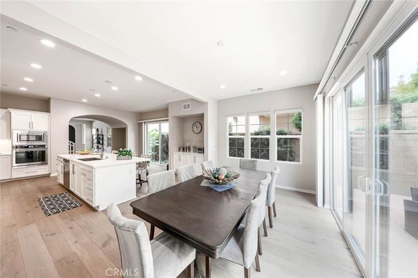Dining room, Interior, Kitchen, Recessed Lighting, Stainless Steel Appliances, Wood Texture Flooring