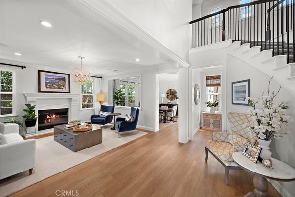 Chandelier, Fireplace, Interior, Living room, Pendant Lights, Recessed Lighting, Wood Texture Flooring