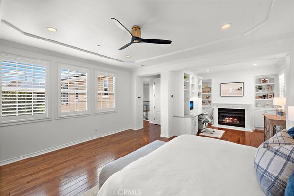 Bedroom, Fireplace, Interior, Recessed Lighting, Wood Texture Flooring