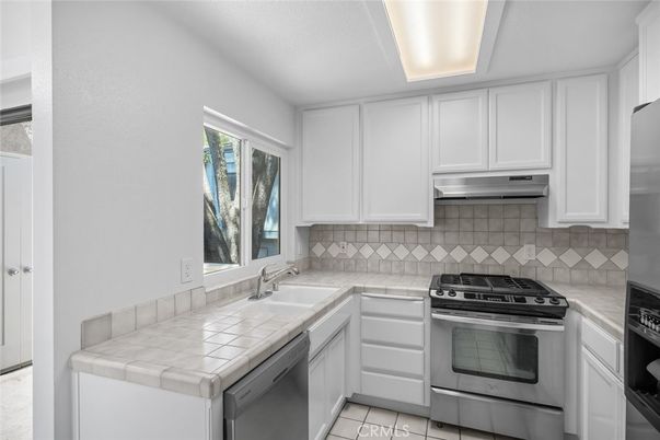 Interior, Kitchen, Stainless Steel Appliances, Tile Countertops