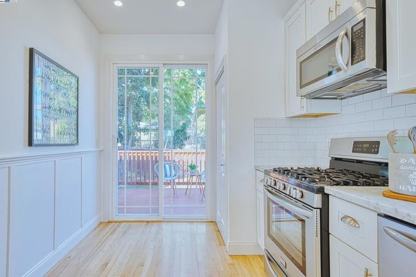 Interior, Kitchen, Recessed Lighting, Stainless Steel Appliances, Wood Texture Flooring