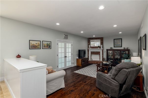 Fireplace, Interior, Living room, Recessed Lighting, Wood Texture Flooring