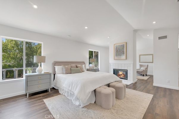 Bedroom, Fireplace, Interior, Recessed Lighting, Wood Texture Flooring