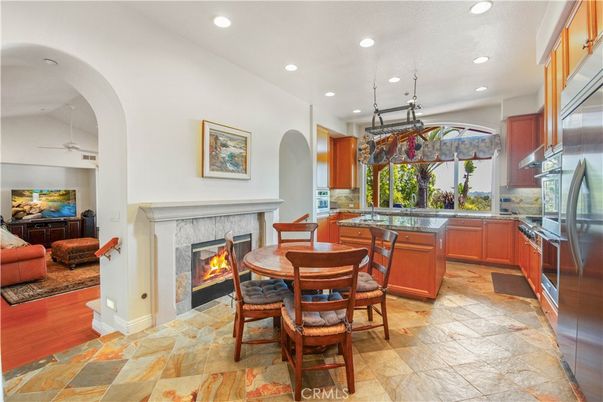 Dining room, Fireplace, Interior, Kitchen, Living room, Pendant Lights, Recessed Lighting, Stainless Steel Appliances