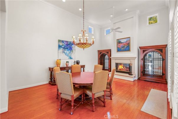 Chandelier, Dining room, Fireplace, Interior, Recessed Lighting, Wood Texture Flooring
